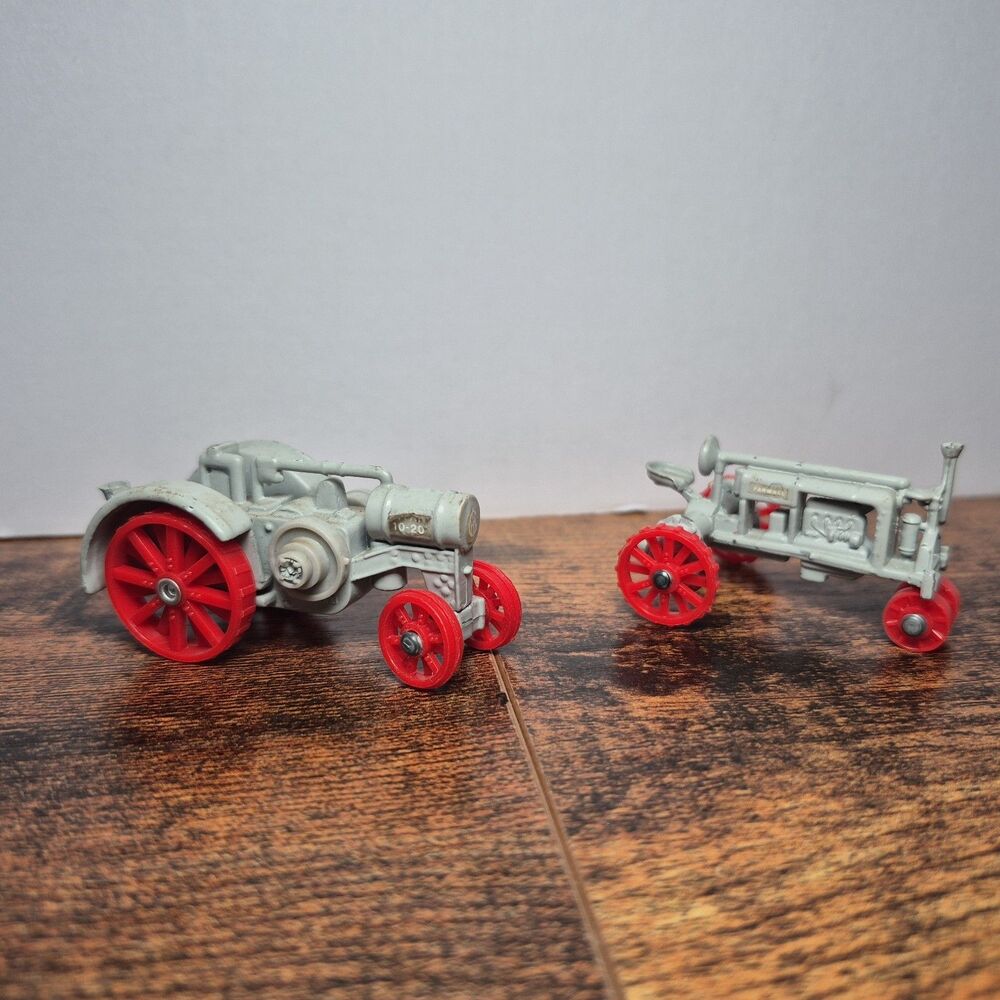 Lot 2 Vintage ERTL McCormick-Deering Titan Farmall Miniature Tractor Metal Toys